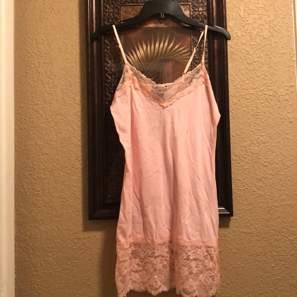 Rue21 lace camisole. Adjustable straps. Worn once. Peach color. Romantic look.